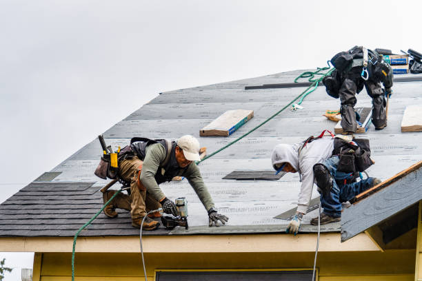 Professional Gutter Installation technician working in Sandstone, MN